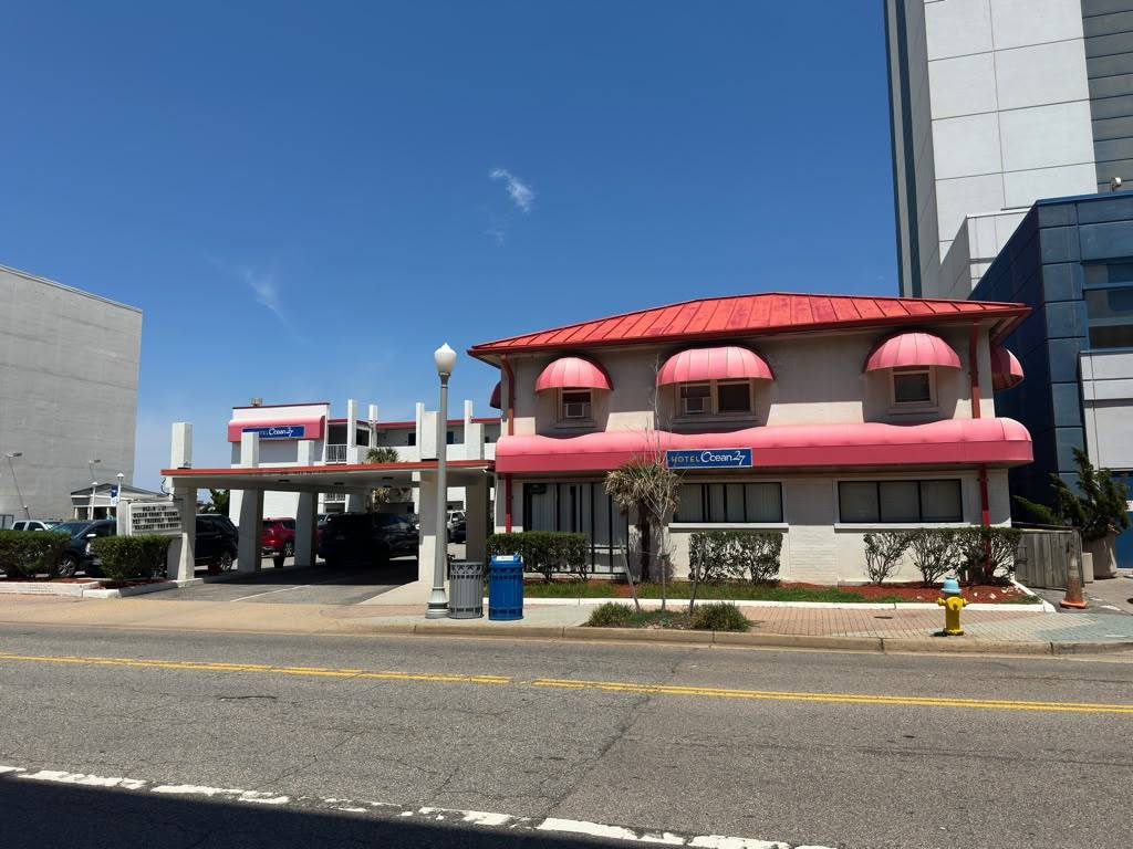 Ocean 27 Ocean Front exterior with pink awnings